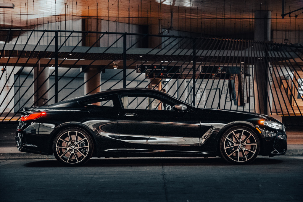 2019 BMW M850i xDrive in Carbon Black Metallic - Side View