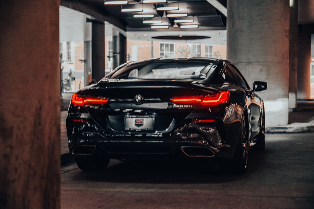 2019 BMW M850i xDrive in Carbon Black Metallic - Rear View