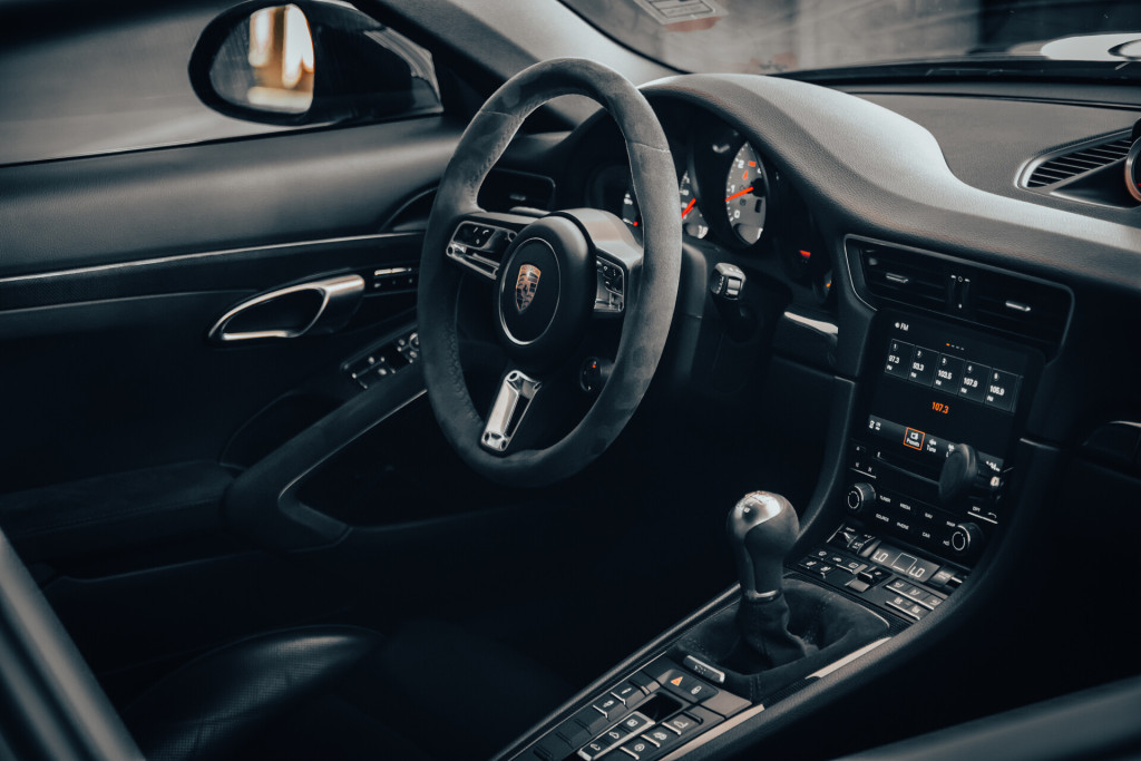 2019 Porsche 911 Carrera GTS in Black - Dashboard From The Passenger’s Window